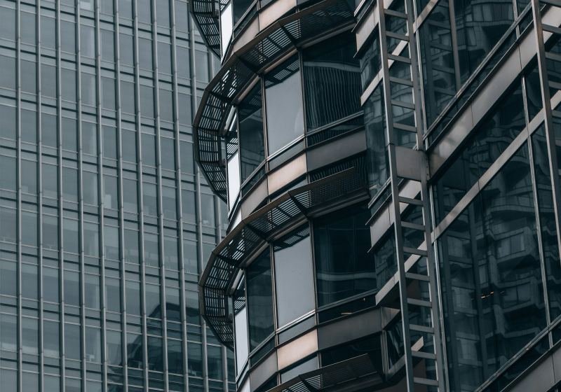 Curved balconies on a modern glass office tower